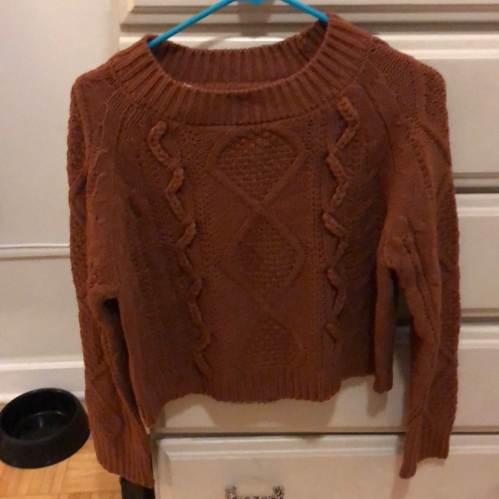Cropped cable knit sweater